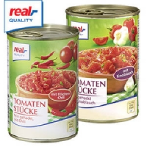 Tomaten gesch&auml;lt, st&uuml;ckig mit Basilikum, Kr&auml;utern, Knoblauch oder Chil