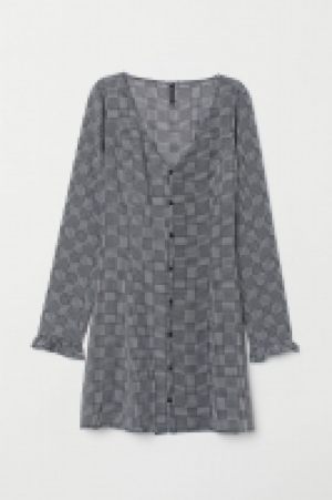  Kleid mit V-Ausschnitt 9.99 €