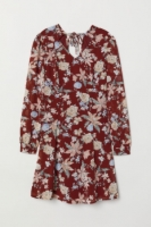  Kleid mit V-Ausschnitt 23.99 €