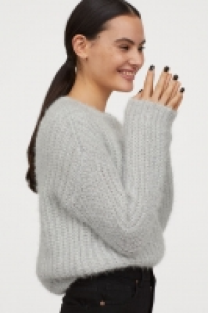  Glitzernder Pullover 17.99 €